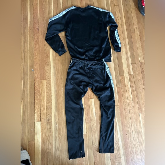 New in the bag black sweatshirt and sweatpants sealed in package.  Sz S, Med, XL - Picture 6 of 13